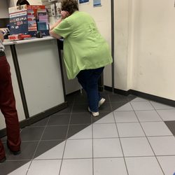 US Post Office - The lady in front of me that almost passed out.