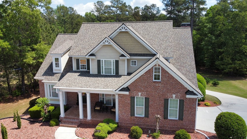 Slide of Roof-Tastic & Beyond Exteriors