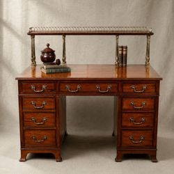 Streets of London Antiques - A small campaign style desk with gallery shelf