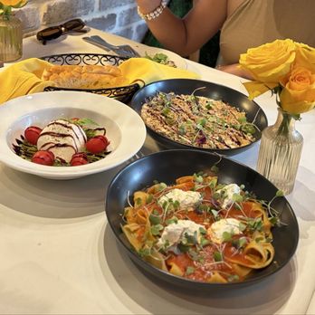 Luca Turci - Burrata, pumpkin ravioli and tomato basil parpadelle - Italian Near Me - Winter Park, Florida Luca Turci - Burrata, pumpkin ravioli and tomato basil parpadelle - Italian Near Me - Winter Park, Florida