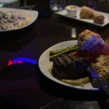 Patini's Grill - Surf and turf + stroganoff in the background. - American Near Me - Stanwood, Washington
