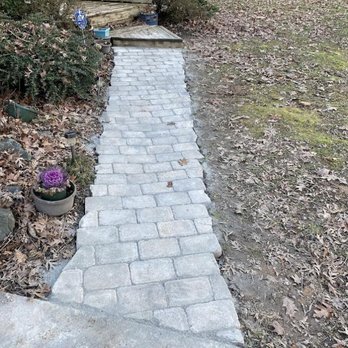 Krypteia Landscape Design - a brick walkway in a backyard - Landscape Architects or Designers Near Me - High Point, North Carolina