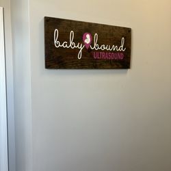 Baby Bound Ultrasound - Sign outside suite entrance