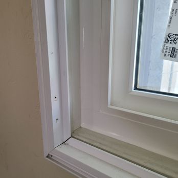 SoCal Window Pros - New Anlin window installed with caulking. - Windows Installation Near Me - Montclair, California