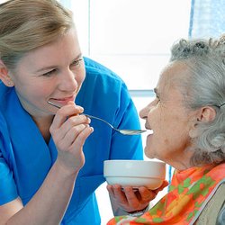 Porter Home Health Services - Assisting a client with eating
