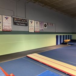 Gymnastic Academy of Boston- Medford - Some of our meet banners! Great job team girls :)