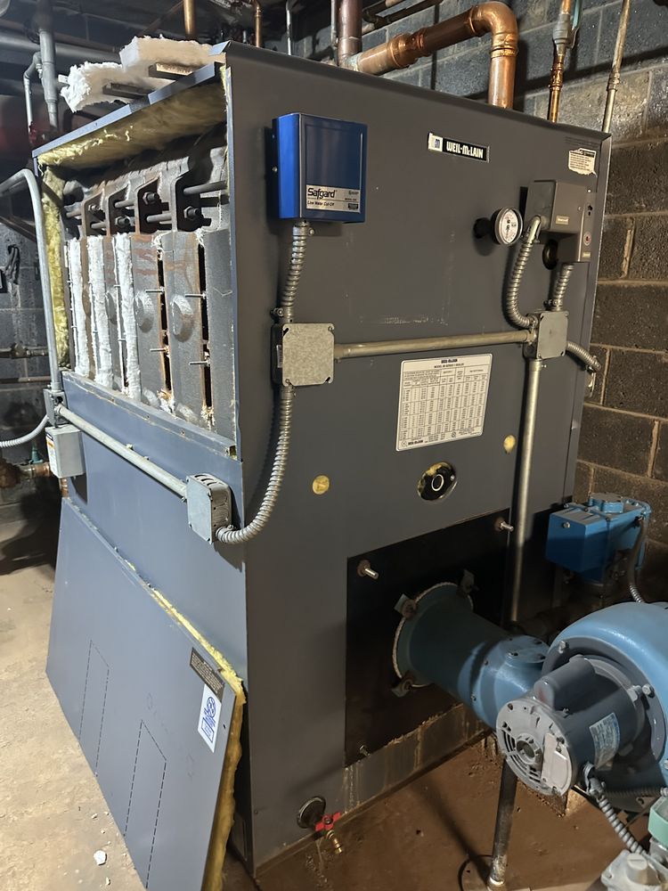 Slide of JL plumbing and heating