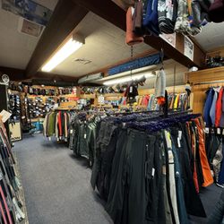 Rogue Ski Shop - Skis snow gear and ski boot area in the back
