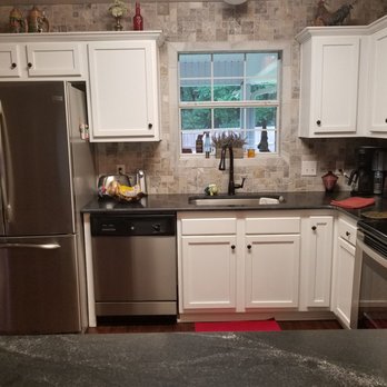 Robert Worth Remodeling - a kitchen with stainless steel appliances - Drywall Installation & Repair Near Me - Milton, Florida Robert Worth Remodeling - a kitchen with stainless steel appliances - Drywall Installation & Repair Near Me - Milton, Florida