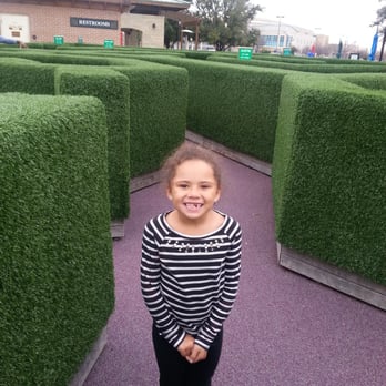 The Village At Allen - Running around in a hedge maze! - Shopping Centers Near Me - Allen, Texas The Village At Allen - Running around in a hedge maze! - Shopping Centers Near Me - Allen, Texas