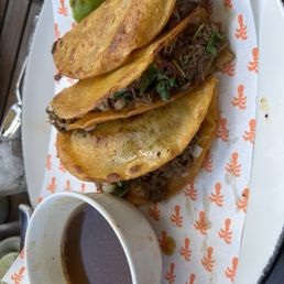 Beef tacos with consume
