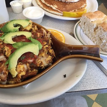 Ocean Diner - The morning after with a biscuit on the side. I asked for sour cream to go with it. - Diners Near Me - Hermosa Beach, California Ocean Diner - The morning after with a biscuit on the side. I asked for sour cream to go with it. - Diners Near Me - Hermosa Beach, California