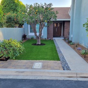 Meadow Landscape - Front yard: combination of artificial turf, pavers, stones, DG, mulch, and drought-tolerant plants. Path lights and uplights too. - Landscaping Near Me - Costa Mesa, California Meadow Landscape - Front yard: combination of artificial turf, pavers, stones, DG, mulch, and drought-tolerant plants. Path lights and uplights too. - Landscaping Near Me - Costa Mesa, California