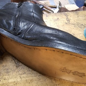 Cobbler's Bench Shoe Repair - This is the after picture with new sole hand stitched, and new zipper. These boots look like new, yet are over 25 years old. - Shoe Repair Near Me - Springfield, Virginia
