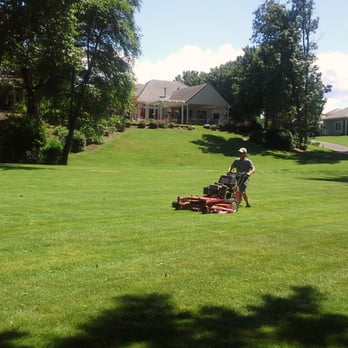 Cuchiara's Landscape Management - a man mowing the grass - Landscaping Near Me - Grants Pass, Oregon Cuchiara's Landscape Management - a man mowing the grass - Landscaping Near Me - Grants Pass, Oregon