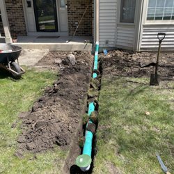 Mani’s Landscaping - Gutter Underground PVC pipe pop-up.