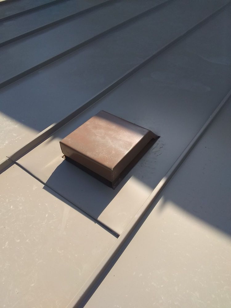 Slide of Camacho Roofing Construction