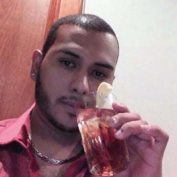 Adonis Lounge - a man drinking a drink - Gay Bars Near Me - New York, New York Adonis Lounge - a man drinking a drink - Gay Bars Near Me - New York, New York