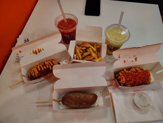 Two Hands Corn Dogs by null