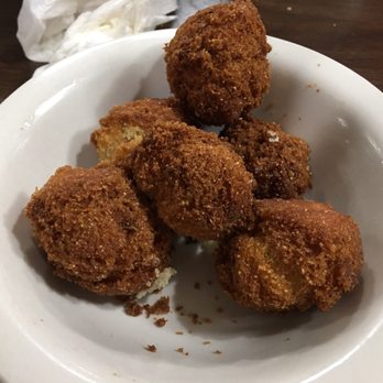 The Pond - a plate of fried food on a table - Seafood Near Me - Hardin, Kentucky