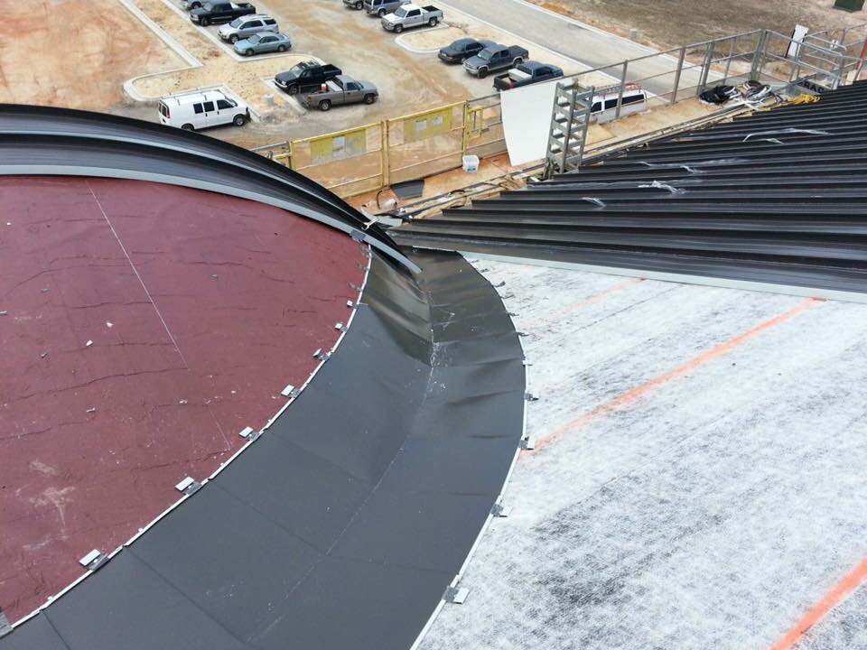 Slide of Patch Adams Roofing