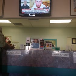 Crenshaw Professional Dental Center - Clerk's watching TV not working with patients