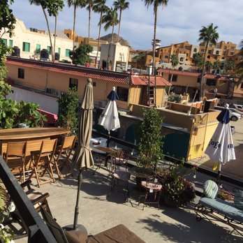Siesta Suites Hotel - 2nd floor patio with happy hour tues-saturday 5-8 - Hotels Near Me - Cabo San Lucas, BCS Siesta Suites Hotel - 2nd floor patio with happy hour tues-saturday 5-8 - Hotels Near Me - Cabo San Lucas, BCS