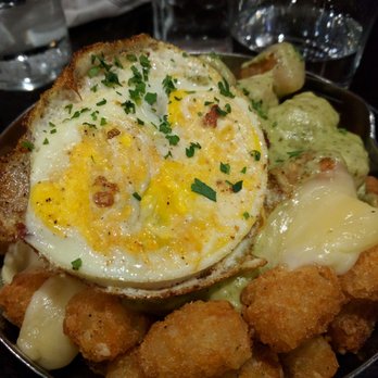 Sienna Mercato - Poutine with tater tots and fried egg. - Italian Near Me - Pittsburgh, Pennsylvania Sienna Mercato - Poutine with tater tots and fried egg. - Italian Near Me - Pittsburgh, Pennsylvania