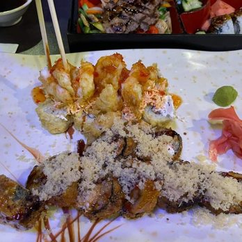 Oyaki Sushi - Oyuki roll (dark colored) and Chilli shrimp sushi - both were amazing! - Sushi Bars Near Me - Dearborn Heights, Michigan Oyaki Sushi - Oyuki roll (dark colored) and Chilli shrimp sushi - both were amazing! - Sushi Bars Near Me - Dearborn Heights, Michigan