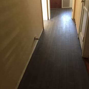 Evolution Flooring - This was just before the molding and transition pieces. Great work! - Flooring Near Me
