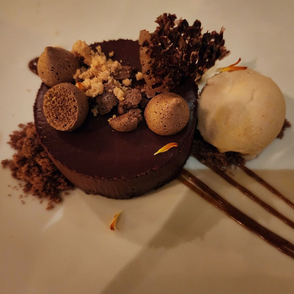 The Front Room - a chocolate dessert with a scoop of vanilla ice cream - Bars Near Me - Santa Rosa, California The Front Room - a chocolate dessert with a scoop of vanilla ice cream - Bars Near Me - Santa Rosa, California