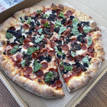 Pizzeria Ruby - Pepperoni pizza with basil, garlic, and mushrooms - Italian Near Me - Springdale, Arkansas Pizzeria Ruby - Pepperoni pizza with basil, garlic, and mushrooms - Italian Near Me - Springdale, Arkansas