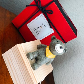 Ecila Sake Chocolates - Four pieces of dark chocolate with hand-cranked bear music box - Chocolatiers & Shops Near Me - Richmond Hill, Ontario Ecila Sake Chocolates - Four pieces of dark chocolate with hand-cranked bear music box - Chocolatiers & Shops Near Me - Richmond Hill, Ontario