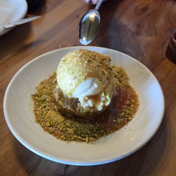 Nick's Seafood Restaurant - Pistacio ice cream on a freshly baked cookie for dessert. - Seafood Near Me - Pacifica, California Nick's Seafood Restaurant - Pistacio ice cream on a freshly baked cookie for dessert. - Seafood Near Me - Pacifica, California