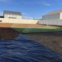 KC Landscapes - Back yard sprinkler, sod and more install