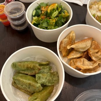 O Dumpling Bar - Cucumber salad, vegan pan Pan-Fried Vegan Dumplings (8 pcs), Chicken Dumplings (12 pcs). - Chinese Near Me - Orange, California O Dumpling Bar - Cucumber salad, vegan pan Pan-Fried Vegan Dumplings (8 pcs), Chicken Dumplings (12 pcs). - Chinese Near Me - Orange, California