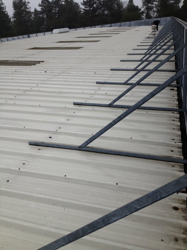 Slide of Adams Roofing