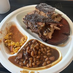 Smokehouse  228 On The Water - 2 Meat platter (Ribs and Bologna) street corn and beans.
