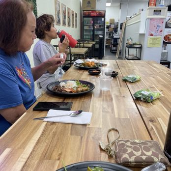 Bulgogi Town - Inside view of the restaurant with friends eating Fried Tofu salad and Beef Bulgogi Meal - Korean Near Me - Azusa, California
