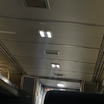 Denver Union Station - Exhaust fumes inside the cabin. Look for the smoke in the light rays. - Train Stations Near Me - Denver, Colorado