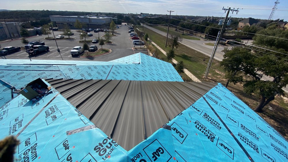 Slide of Action Roofing & Construction