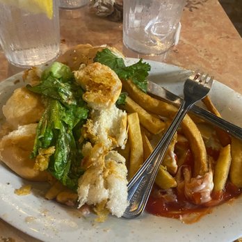 Caroline's - The aftermath of the po boy. Was stuffed! - American Near Me - Key West, Florida Caroline's - The aftermath of the po boy. Was stuffed! - American Near Me - Key West, Florida
