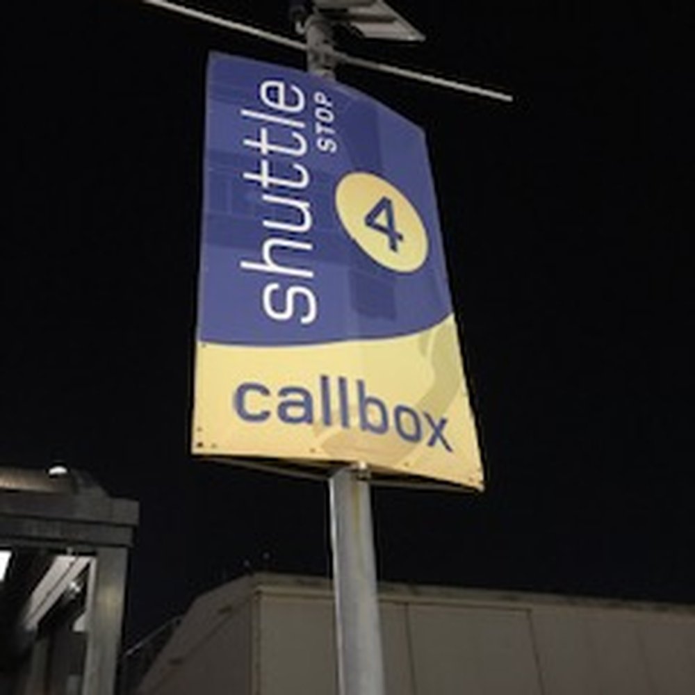 OAK Official Parking - a shuttle stop sign - Parking Near Me - Oakland, California OAK Official Parking - a shuttle stop sign - Parking Near Me - Oakland, California
