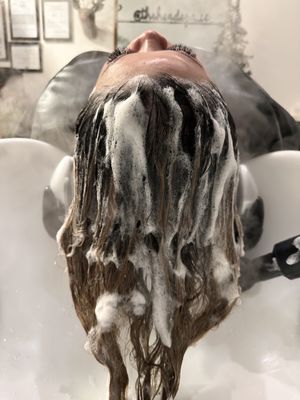 The HS Signature Head Spa in Action - This is Cleansing process of the scalp during the head spa treatment. Scalp and hair are bathe in the gentle warmth of spa mist to further loosen up the gunks trapped in between hair cuticles and follicles. Gentle head massage helps remove the gunks and promote scalp circulation. This process sets the mood for a soothing relaxed state.