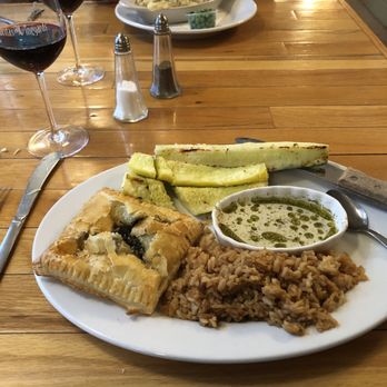 Little Traverse Inn - a plate of food and a glass of wine - Bed & Breakfast Near Me - Maple City, Michigan Little Traverse Inn - a plate of food and a glass of wine - Bed & Breakfast Near Me - Maple City, Michigan