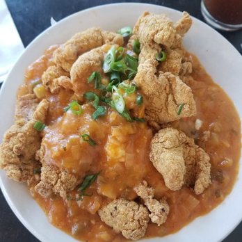 Bistro Byronz - Acadiana Grits-cheese grits with thin crispy fried catfish with crawfish etouffee. - Salad Near Me - Baton Rouge, Louisiana Bistro Byronz - Acadiana Grits-cheese grits with thin crispy fried catfish with crawfish etouffee. - Salad Near Me - Baton Rouge, Louisiana