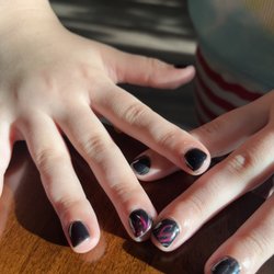 Tracy Nails Spa - 7yo's nails. Accent nail is middle finger. Not what she wanted.