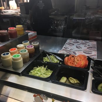 Harvey's - a variety of salads and condiments - Burgers Near Me - Toronto, Ontario