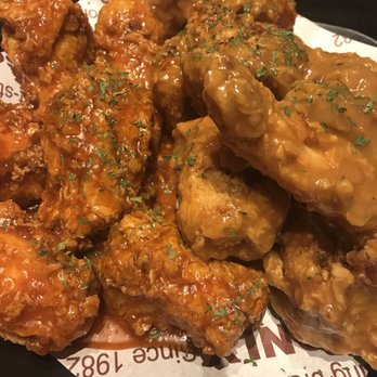 Pelicana Chicken - Flushing - Pelicana lvl 2 on the left and Honey Garlic on the right - Korean Near Me - Flushing, New York Pelicana Chicken - Flushing - Pelicana lvl 2 on the left and Honey Garlic on the right - Korean Near Me - Flushing, New York