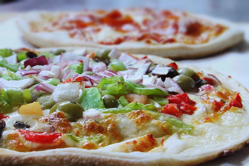 Magno Pizza Palace Logo